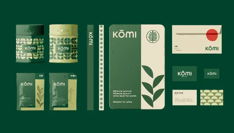 Komi matcha visual identity with green and cream tins, pouches, botanical patterns and stationery